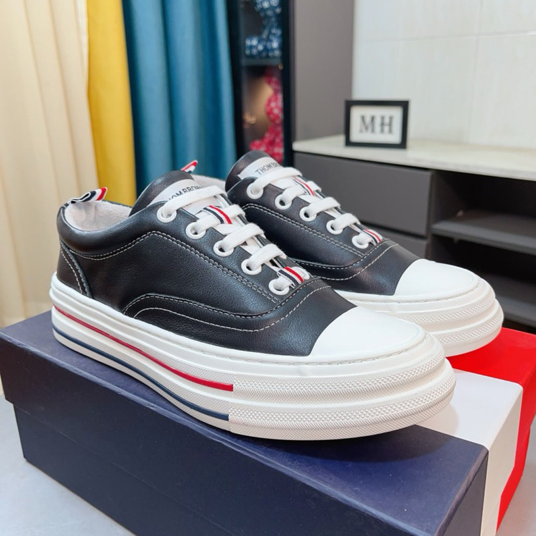 Thom BrowneClassic Premium Leather Sneakers with Grosgrain Buckle - Timeless Design