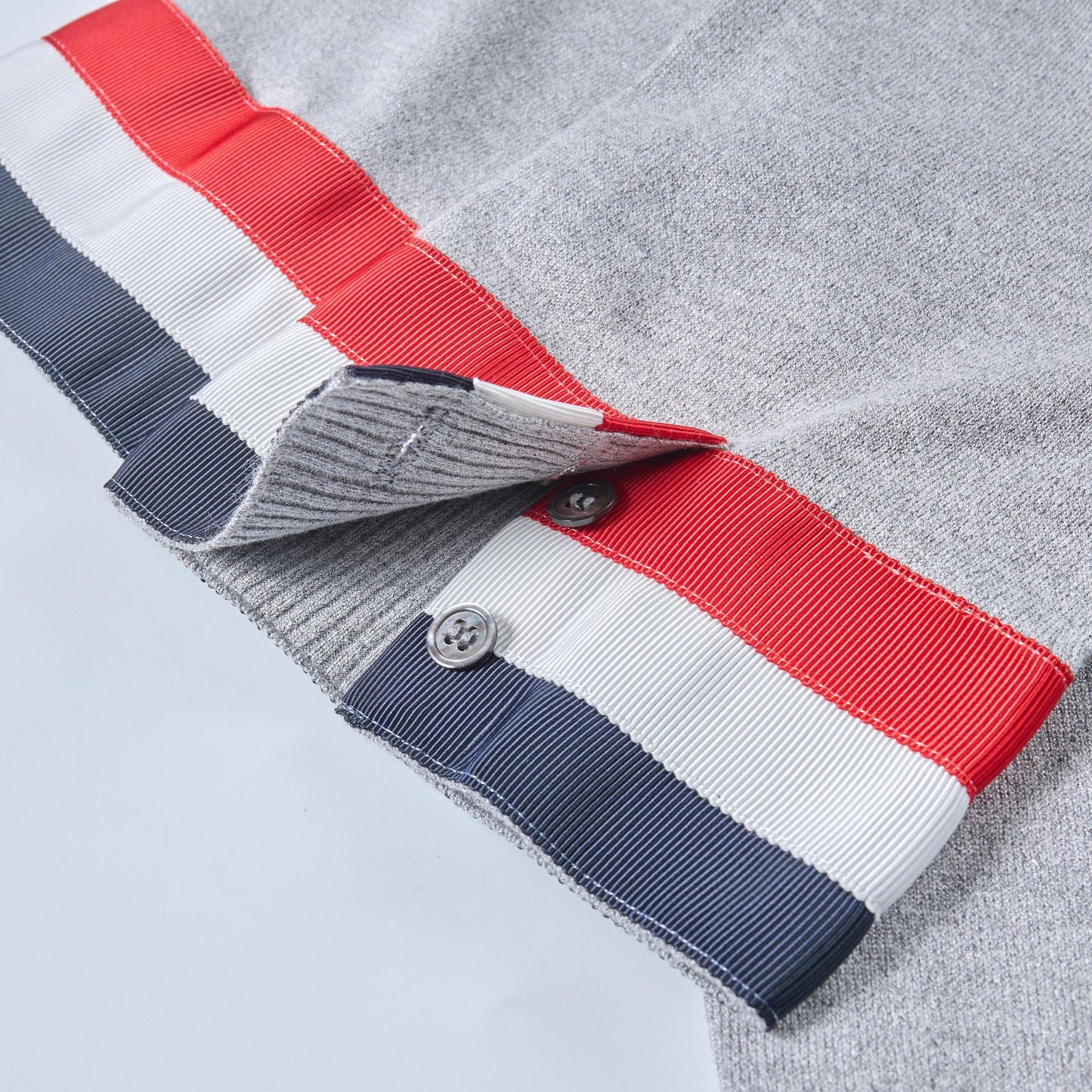 Thom BrowneSoft Knitted Cotton T-Shirt - Classic Button-Front Design