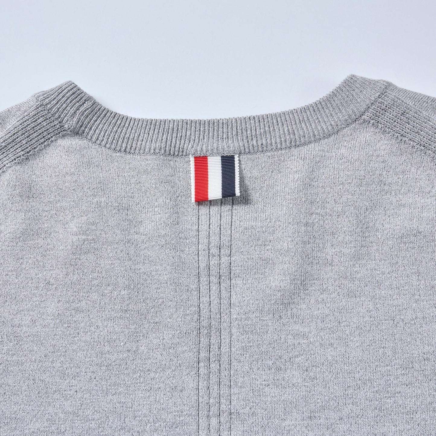 Thom BrowneSoft Knitted Cotton T-Shirt - Classic Button-Front Design