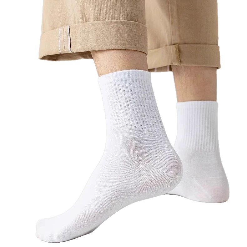 A pair of solid-color disposable socks