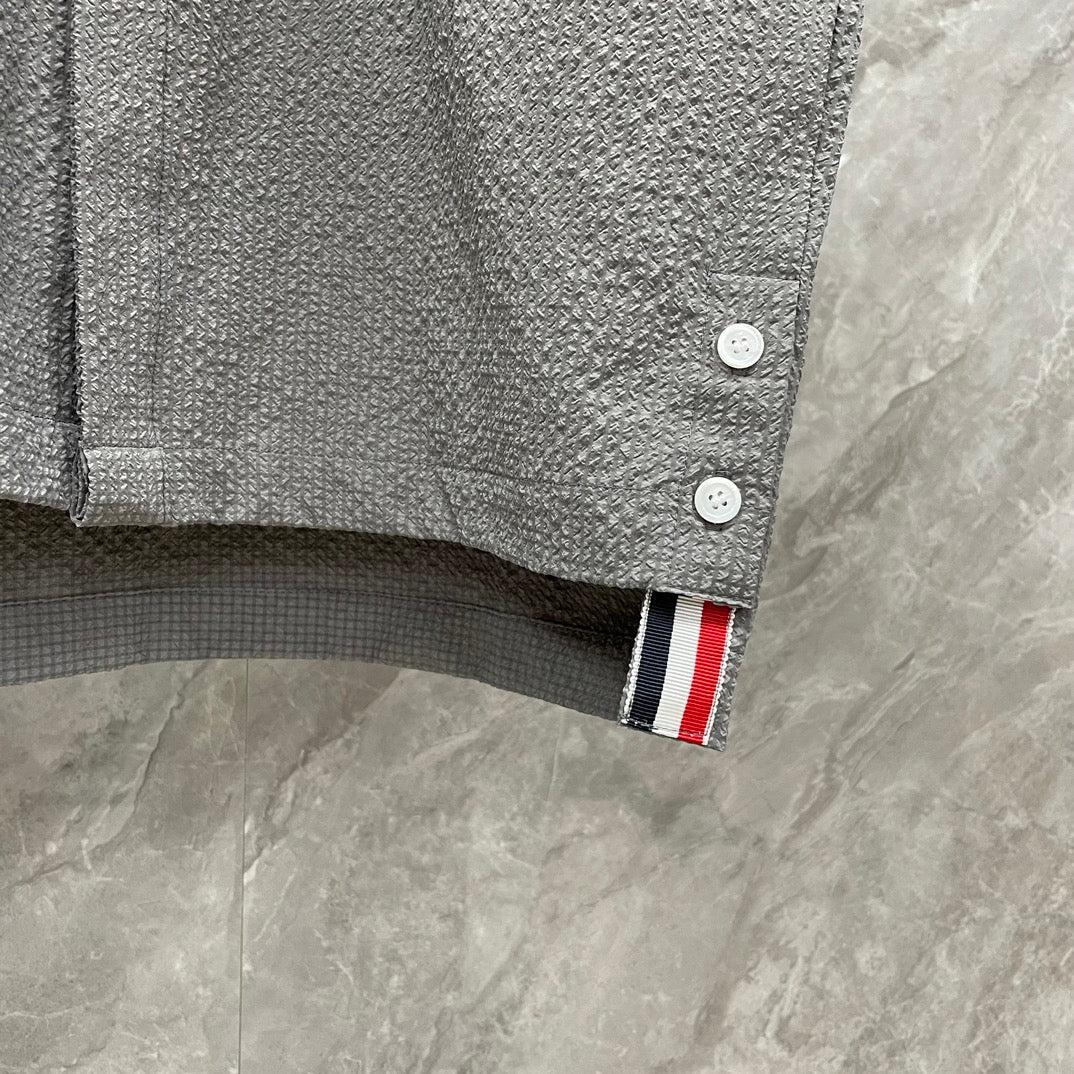 Thom BrowneMen's Seersucker Polo Shirt | 4-Bar Detail | Textured Elegance
