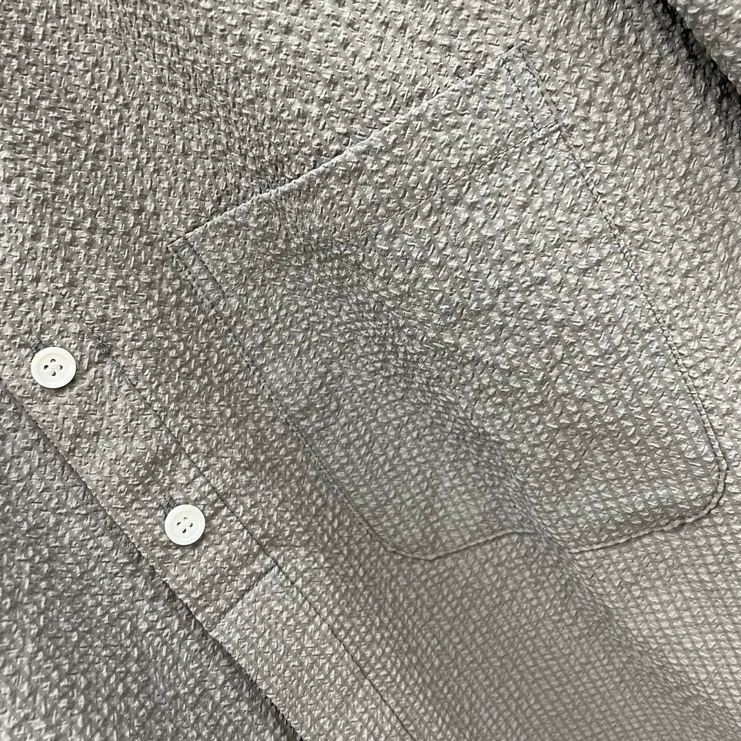 Thom BrowneMen's Seersucker Polo Shirt | 4-Bar Detail | Textured Elegance